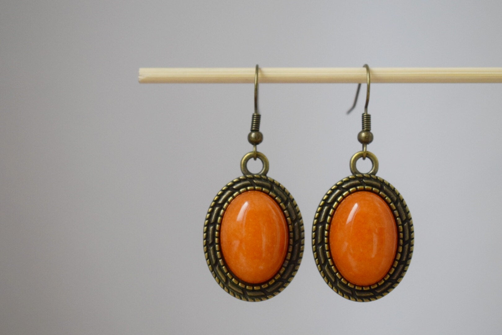 Vintage Orange Jade Dangle Earrings: Bronze Filigree Pendant