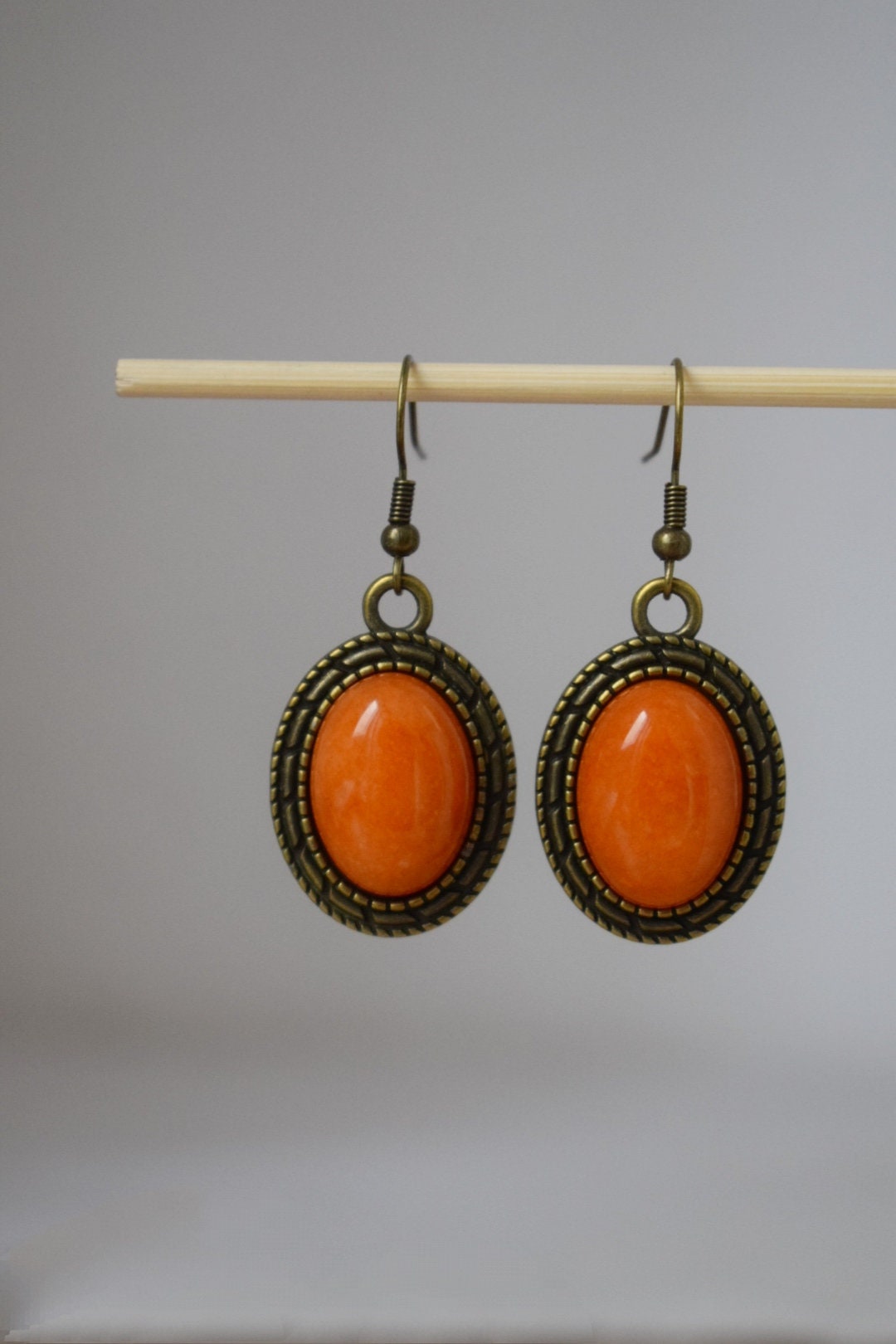 Vintage Orange Jade Dangle Earrings: Bronze Filigree Pendant