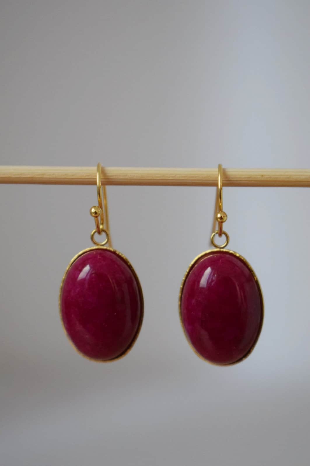 Red Jade Dangle Earrings: Gold Plated Oval Gemstone