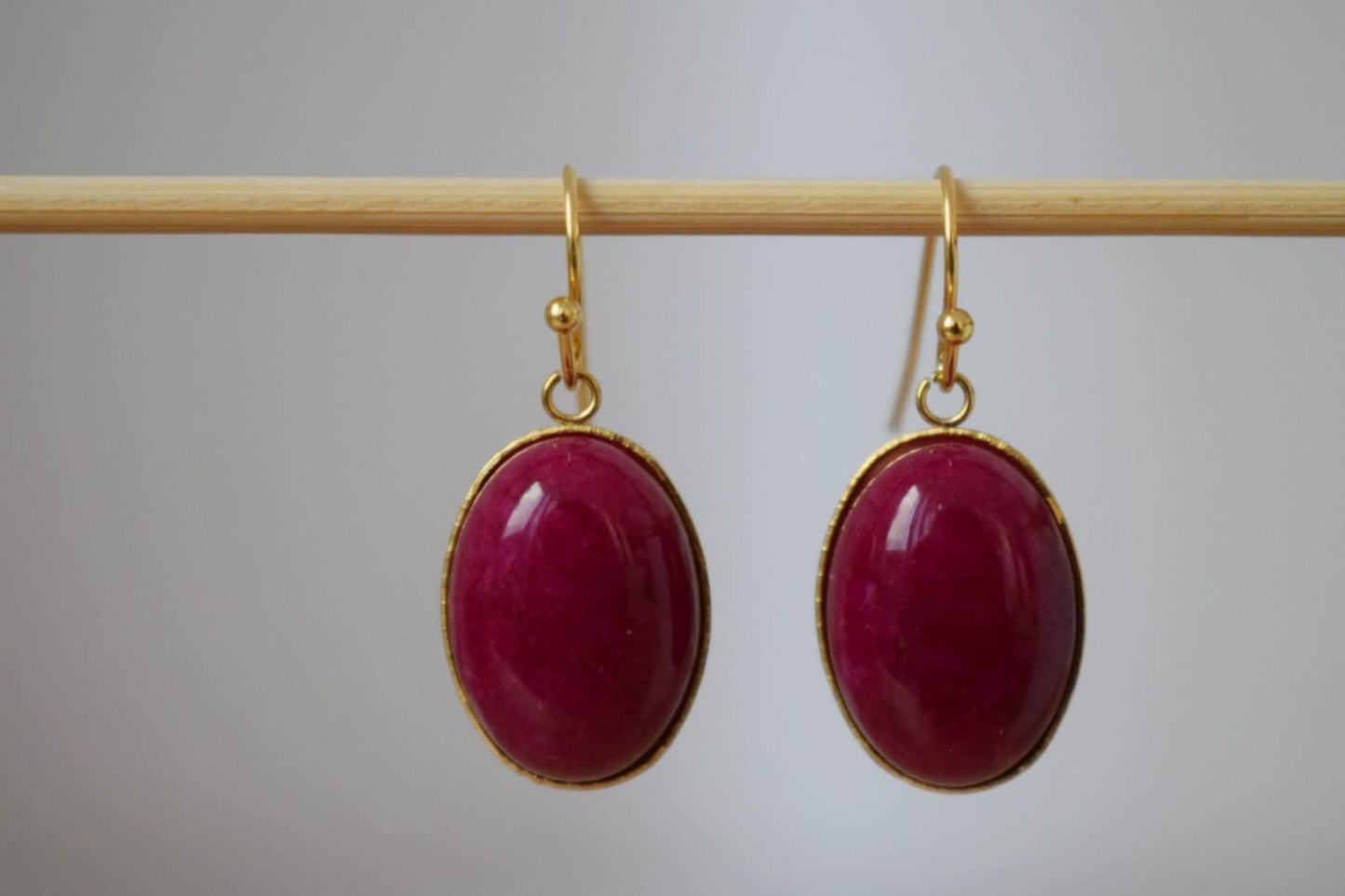 Red Jade Dangle Earrings: Gold Plated Oval Gemstone