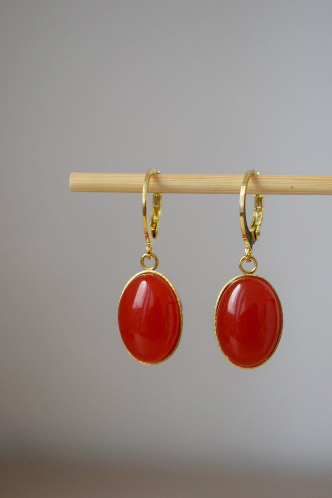 Red Jade Dangle Earrings: Gold Plated Huggie Oval Gemstone Earrings