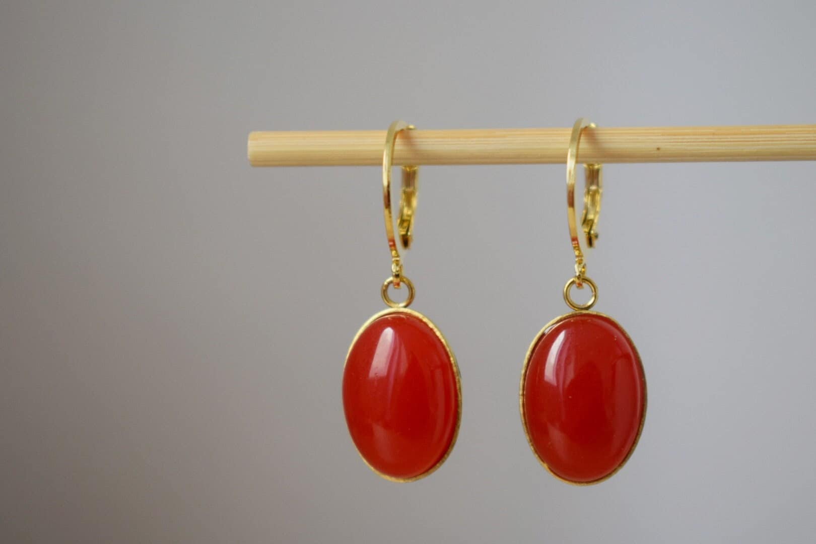 Red Jade Dangle Earrings: Gold Plated Huggie Oval Gemstone Earrings
