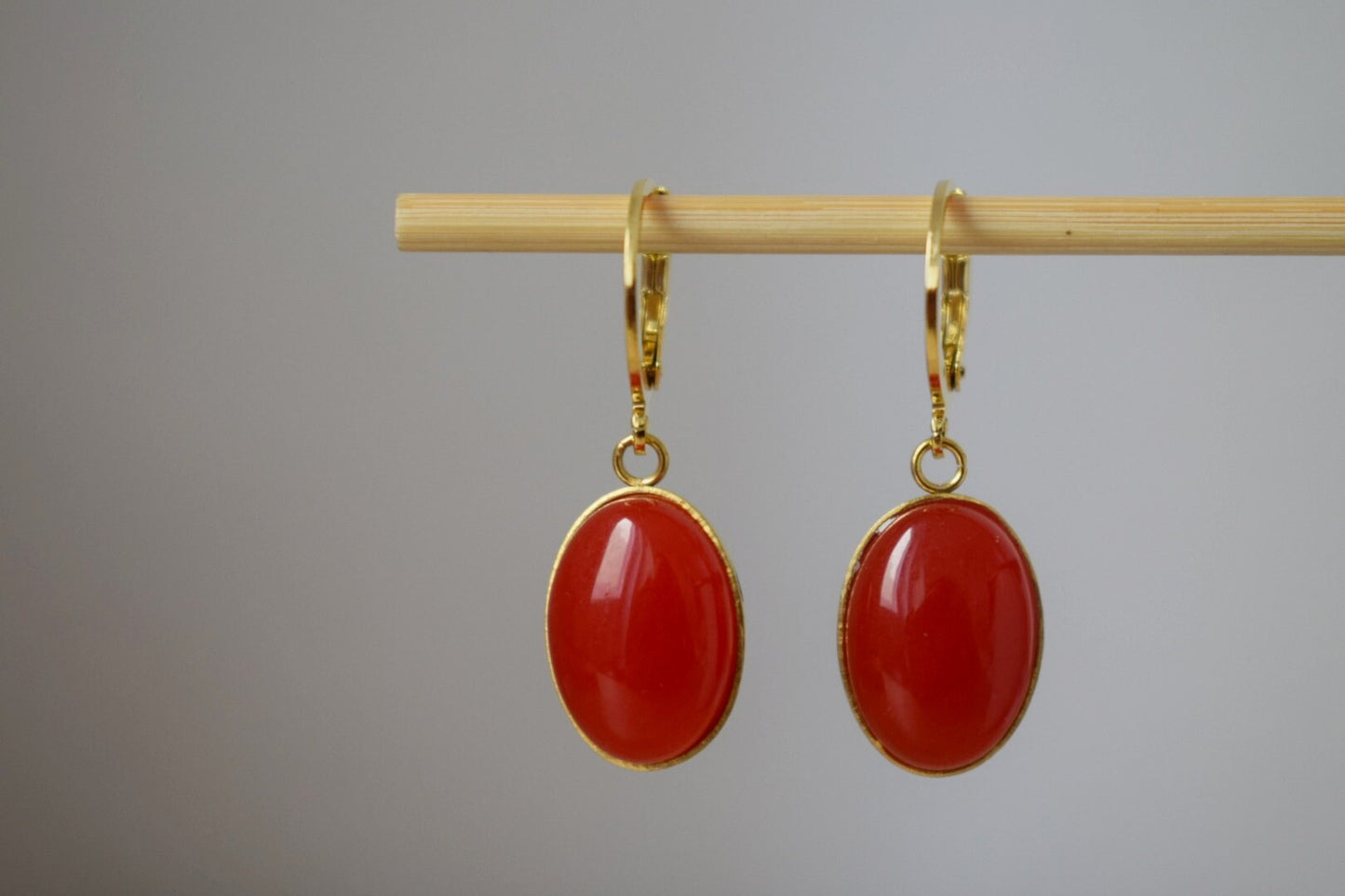 Red Jade Dangle Earrings: Gold Plated Huggie Oval Gemstone Earrings